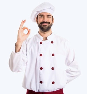 Smiling chef with beard giving OK sign