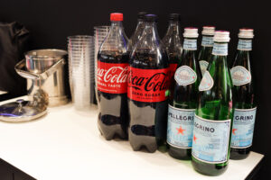 Ice bucket and sodas en waters on a buffet