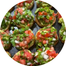 Crostini with guacamole and pico de gallo round
