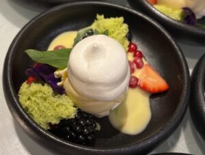 Harry's dessert creation with meringue and red fruits and cream of tonka beans